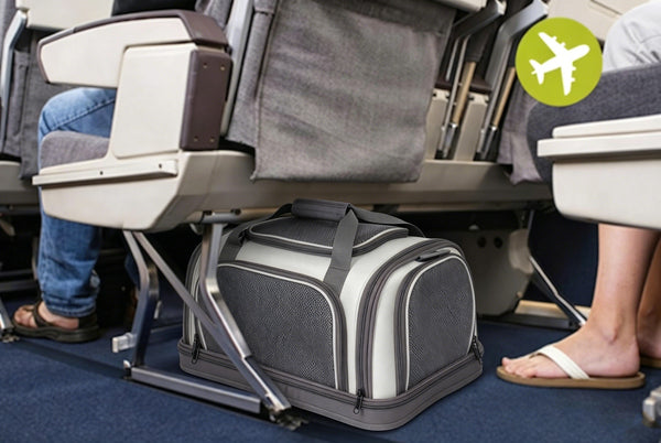 Sunnypet soft-sided pet travel carrier stowed under an airplane seat